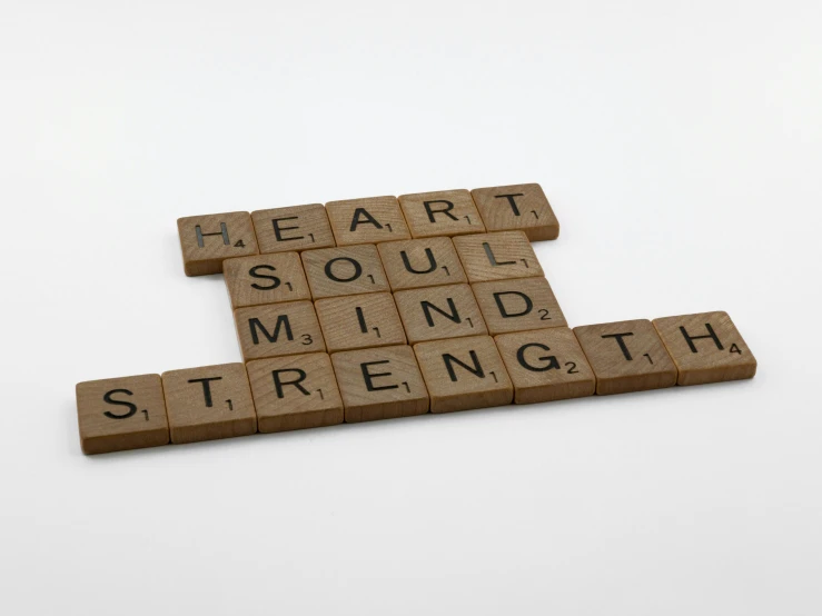a scrabble that says heart, soul, mind, strength, by Nina Hamnett, high quality product photo, 3 4 5 3 1, battered, hgh