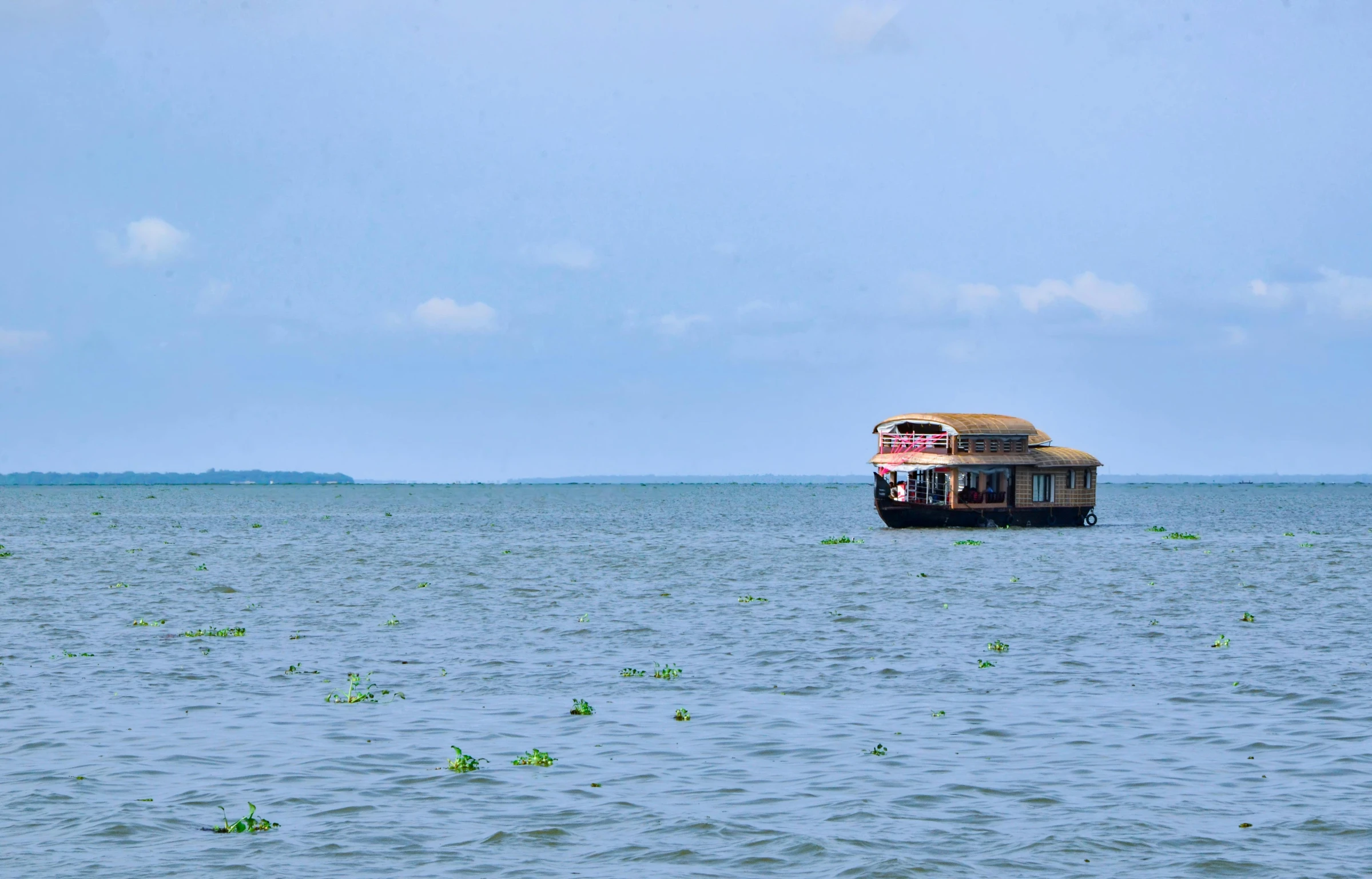 a boat in the middle of a large body of water, hurufiyya, vmk myvmk, fan favorite, panoramic view, brown