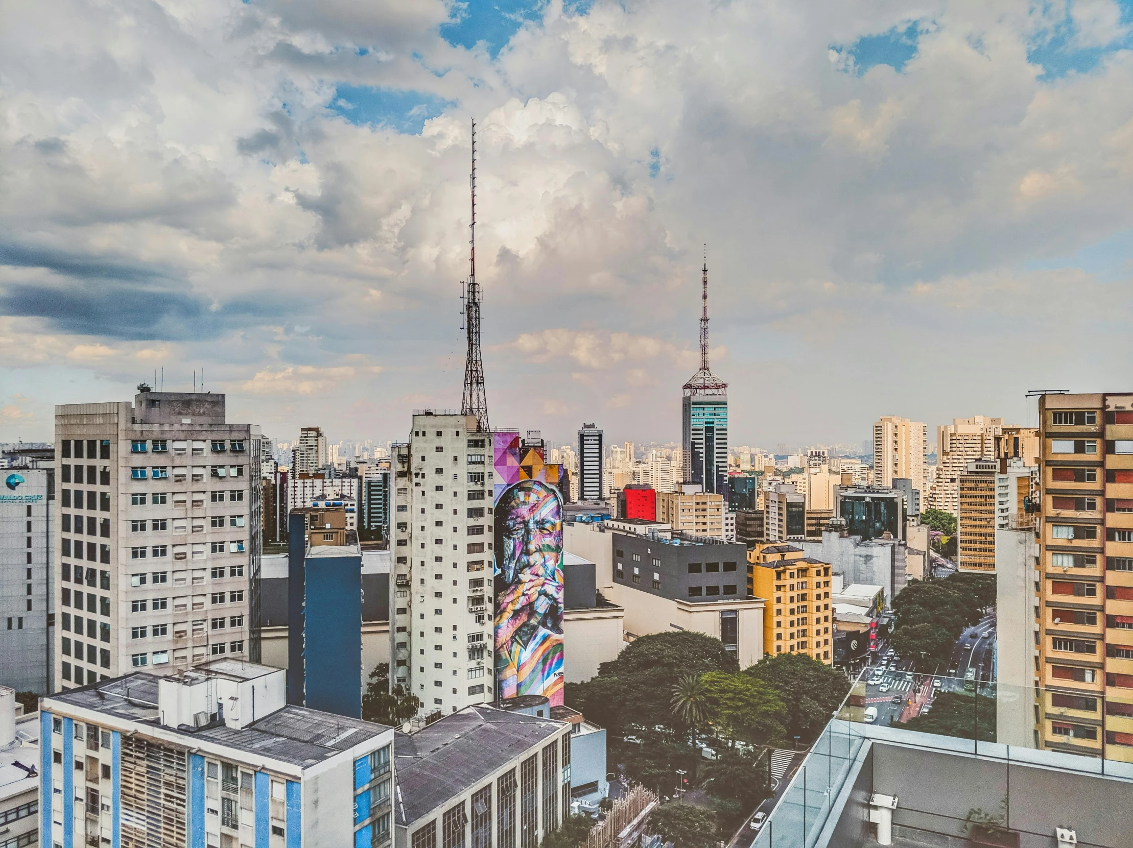 a view of a city from the top of a building, by Felipe Seade, graffiti, tall buildings, gigapixel photo, profile image, avenida paulista