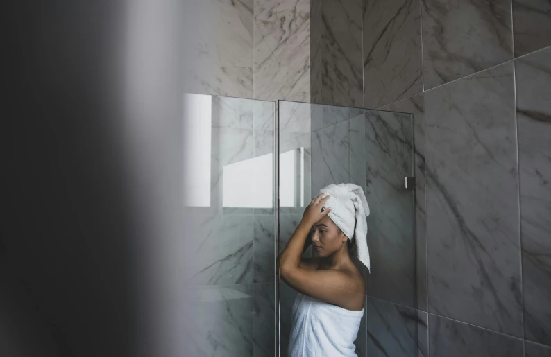 a woman standing in a shower with a towel on her head, pexels contest winner, fan favorite, background image, instagram photo, leaked