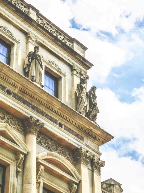 a clock that is on the side of a building, a statue, inspired by Michelangelo Unterberger, pexels contest winner, neoclassicism, towering high up over your view, yellow windows and details, highly detailed stonework, godrays from the right