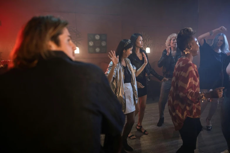 a group of people dancing at a party, happening, riverdale, high - res, multiple stories, on location
