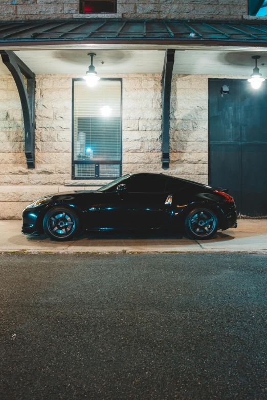 a black sports car parked in front of a building, profile image, thicc build, late night, single subject