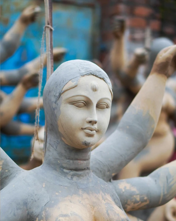 a close up of a statue of a woman, a statue, by Sunil Das, stands in center with open arms, patron saint of 🛸🌈👩🏾, assamese aesthetic, porcelain skin ”