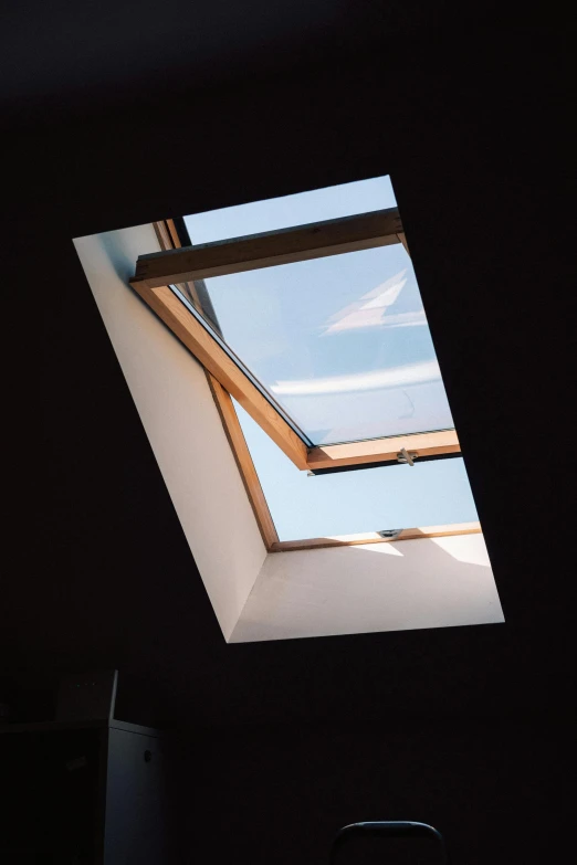 a view of a skylight in a dark room, neighborhood outside window, immaculate shading, clear skies, glowy light