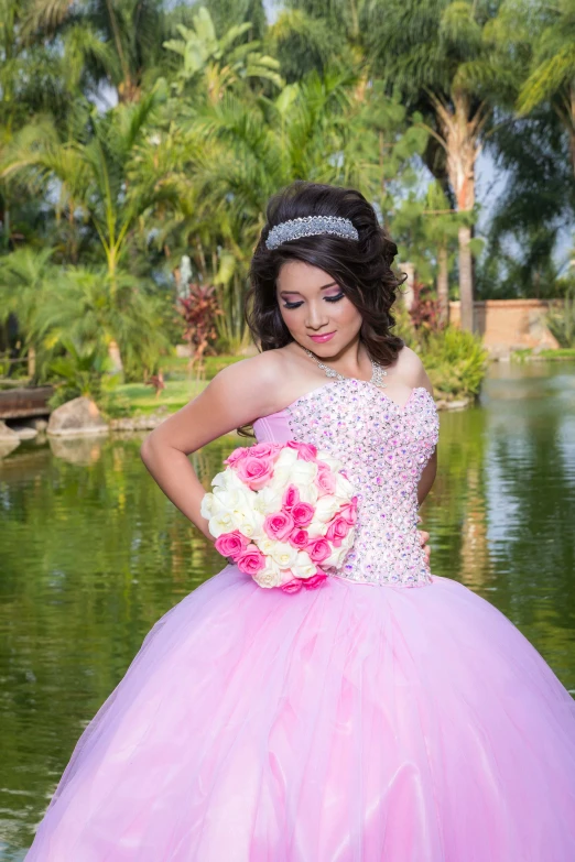 a woman in a pink ball gown holding a bouquet, lorena avarez, riverside, slide show, profile pic