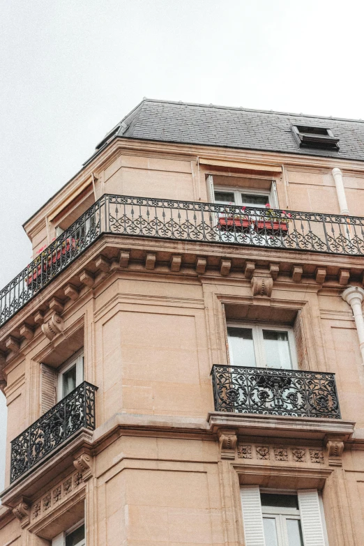 a clock that is on the side of a building, splendid haussmann architecture, fan favorite, bay window, pictured from the shoulders up