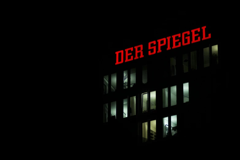 a clock on the side of a building at night, an album cover, inspired by Siegfried Haas, berlin secession, dren from splice, spiel des jahres, red leds, top secret