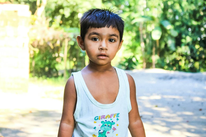 a young boy holding a tennis racquet on a tennis court, an album cover, pexels contest winner, sumatraism, on a jungle forest train track, avatar image, serious expression, sleeveless