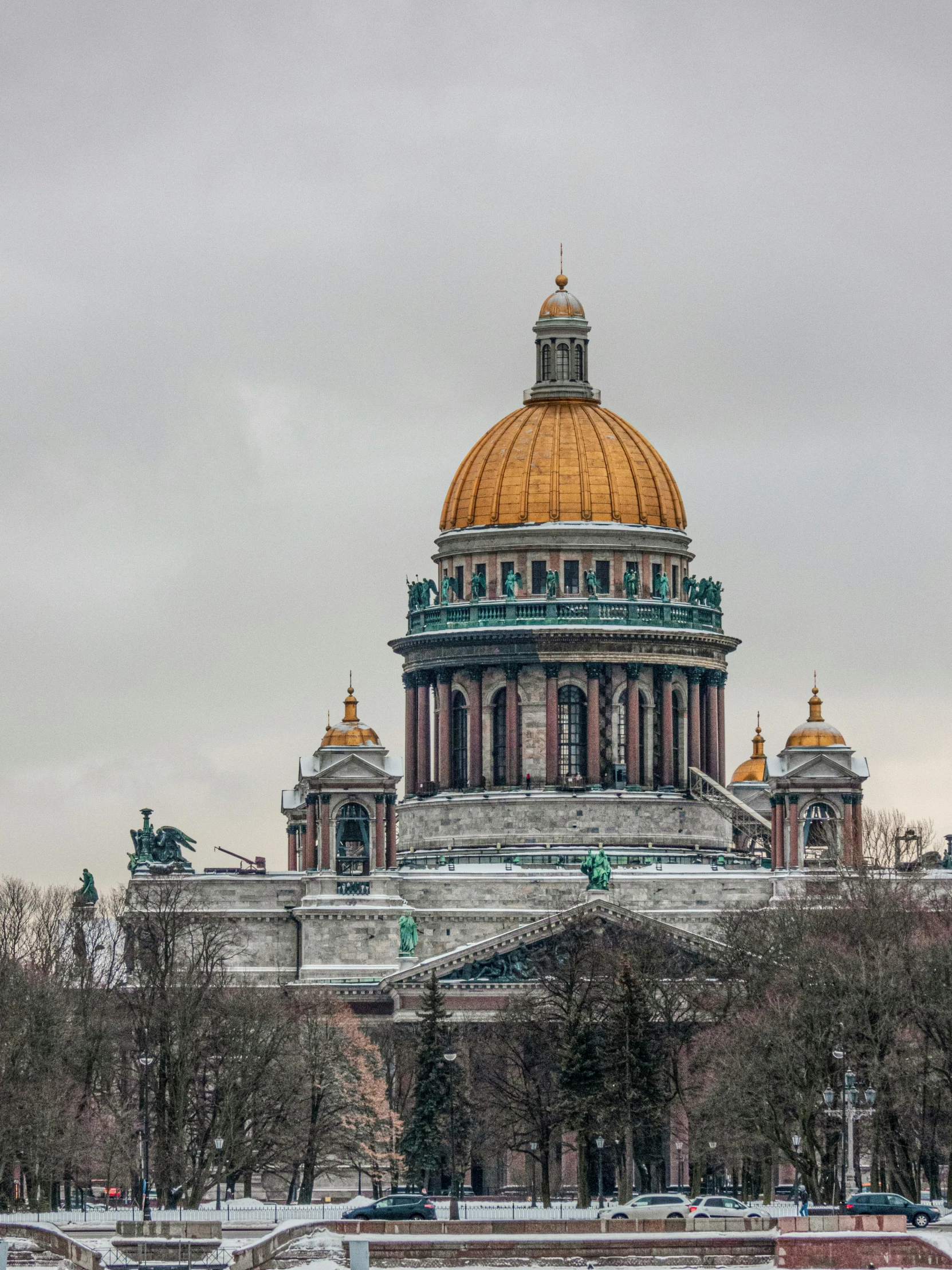 a large building sitting on top of a snow covered field, inspired by Vasily Surikov, pexels contest winner, art nouveau, dome, under a gray foggy sky, 000 — википедия, on a great neoclassical square