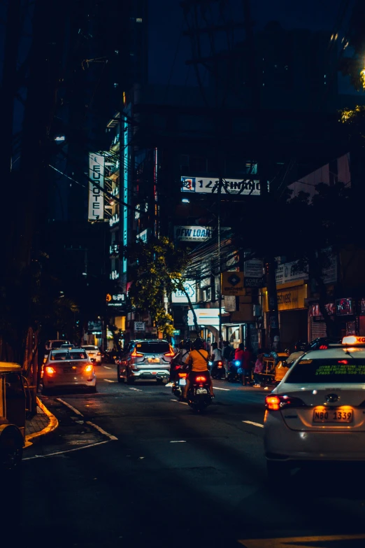 a city street filled with lots of traffic at night, pexels contest winner, in a tropical and dystopic city, square, high quality image, taiwan