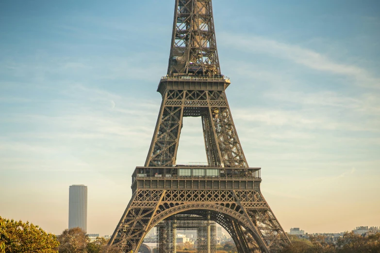 a view of the eiffel tower from across the river, pexels contest winner, art nouveau, 9 9 designs, high resolution photograph, tall metal towers, 2022 photograph