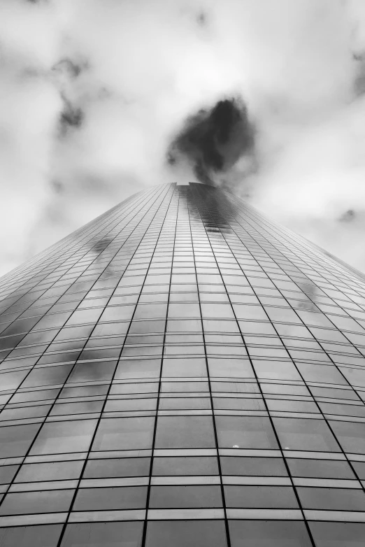 a black and white photo of a tall building, unsplash contest winner, vorticism, full of glass. cgsociety, toxic clouds, burned, :6