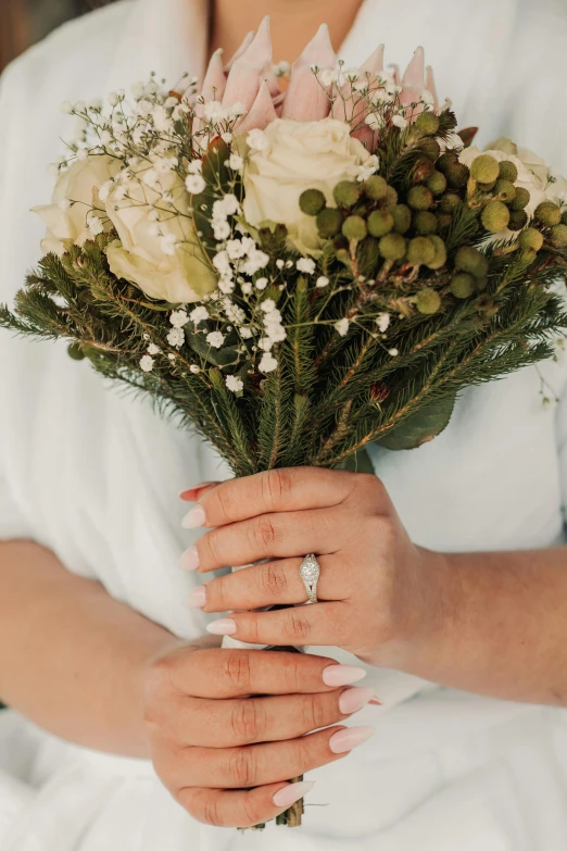 a woman holding a bouquet of flowers in her hands, inspired by Pieter de Ring, unsplash, romanticism, lots de details, rings, silver，ivory, clean and pristine design