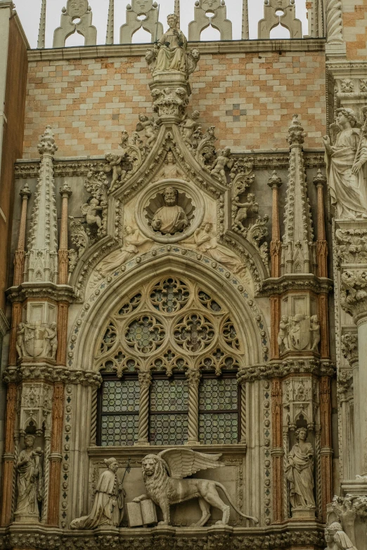 a statue of a man riding a horse in front of a building, inspired by Quirizio di Giovanni da Murano, symetrical detailed faces, archways between stalagtites, ornate spikes, carved marble