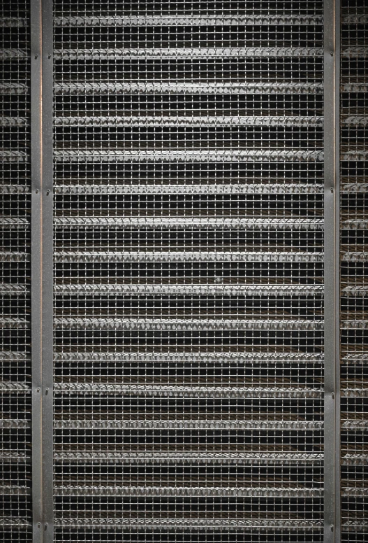 a close up of a metal grill grate, inspired by Andreas Gursky, serial art, refrigerated storage facility, pc screen image, seeds, intricate ”