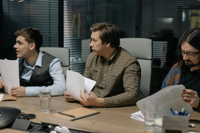 a group of people sitting around a wooden table, in an office, anton fadeev 8 k, production still, background image