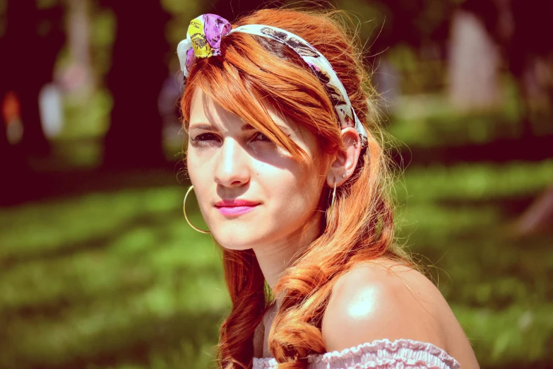a close up of a woman with a flower in her hair, a colorized photo, by Lucia Peka, trending on pixabay, orange hair bow, bella thorne, bandana, in sunny weather