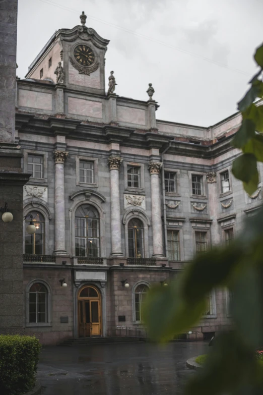 a large building with a clock on the front of it, pexels contest winner, quito school, gloomy library, foliage, edinburgh, rococo details