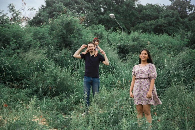 a couple of people that are standing in the grass, a portrait, pexels contest winner, zeen chin and farel dalrymple, improvisational, jordan grimmer and natasha tan, distant full body shot