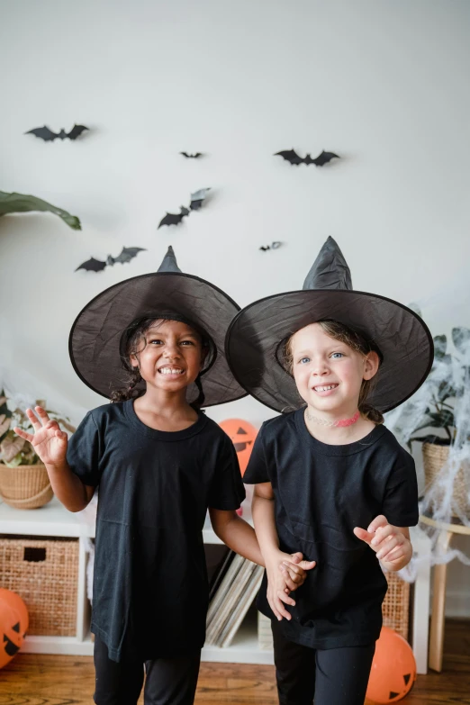 two young children dressed up in halloween costumes, pexels contest winner, visual art, wearing black dress and hat, chiroptera ears, high, instagram story