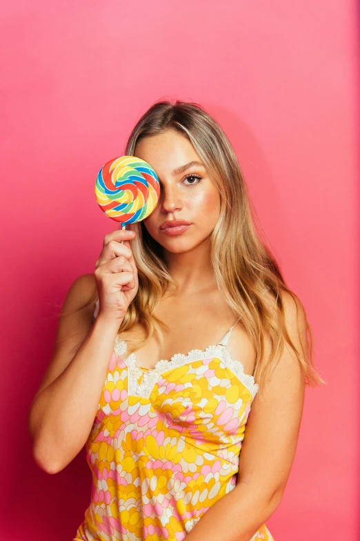 a woman holding a lollipop in front of her face, trending on pexels, portrait sophie mudd, wavy lingeries, colorful dress, colorful]”