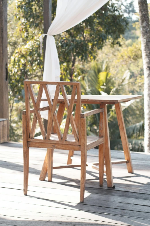 a wooden table sitting on top of a wooden deck, inspired by Constantin Hansen, armchairs, zoomed in shots, laos, square