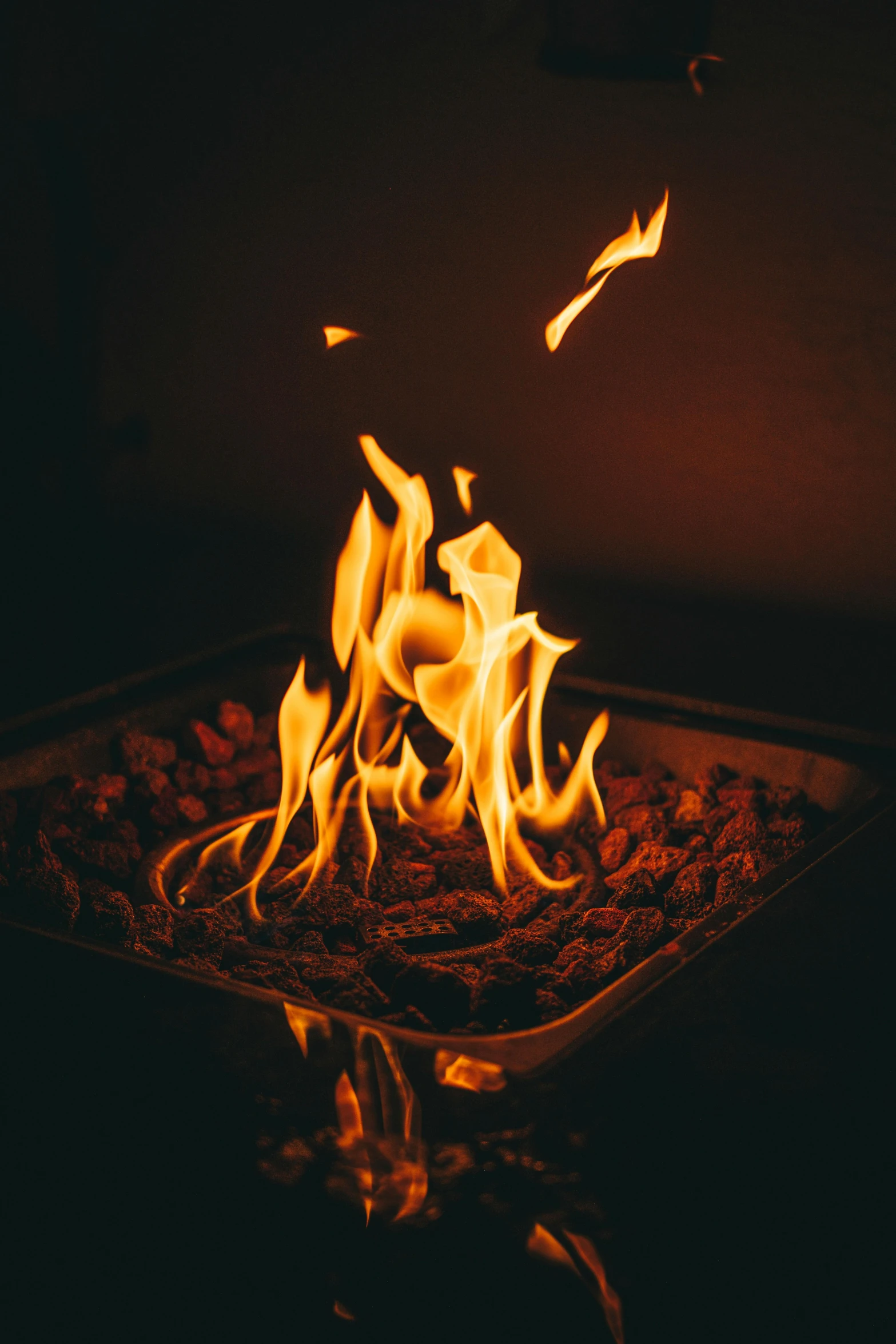 a fire pit with flames coming out of it, resin, low-key, cooked to perfection, instagram photo