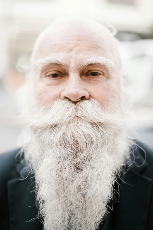 a man with a long white beard wearing a suit, unsplash, square masculine facial features, humans of new york, bald, hyperdetailed