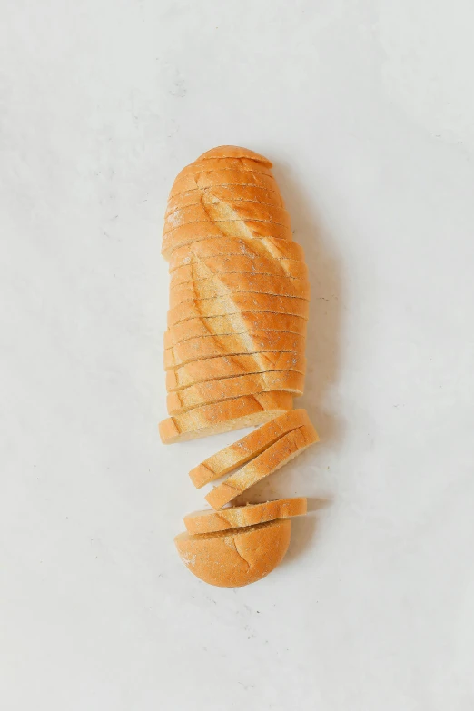 a loaf of bread sitting on top of a white counter, sliced bread in slots, vine twist, striking pose, curvy build