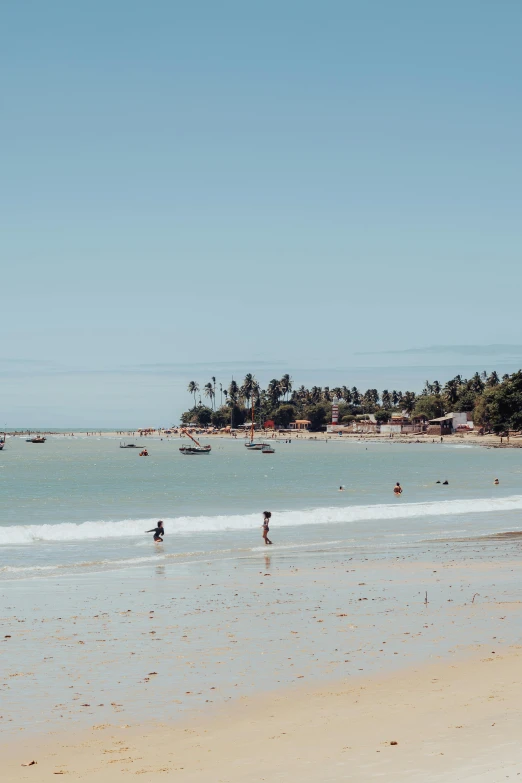 a group of people standing on top of a sandy beach, streets of salvador, coconut trees, minimalist, swimming