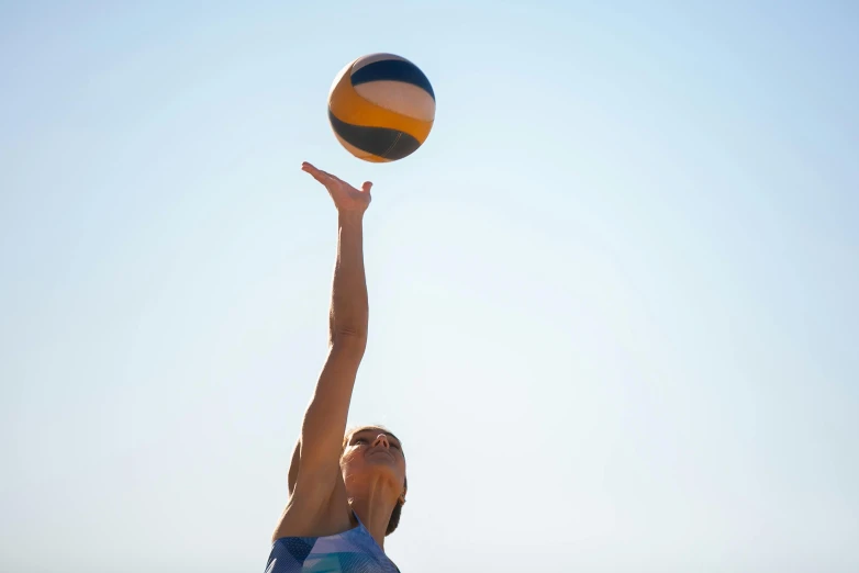 a woman reaching up to catch a volleyball ball, unsplash, arabesque, manly, beach tennis, 15081959 21121991 01012000 4k, mid view