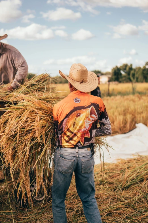 a couple of men standing next to each other in a field, by Elizabeth Durack, trending on unsplash, process art, wearing a straw hat and overalls, people at work, highly intricate detailed, harvest