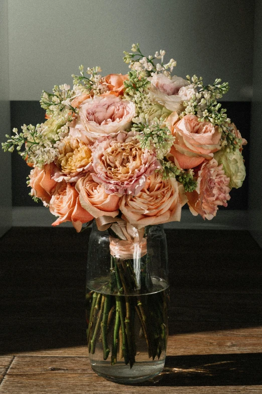 a vase filled with pink and white flowers, toned orange and pastel pink, crown of mechanical peach roses, award - winning crisp details ”, with backdrop of natural light