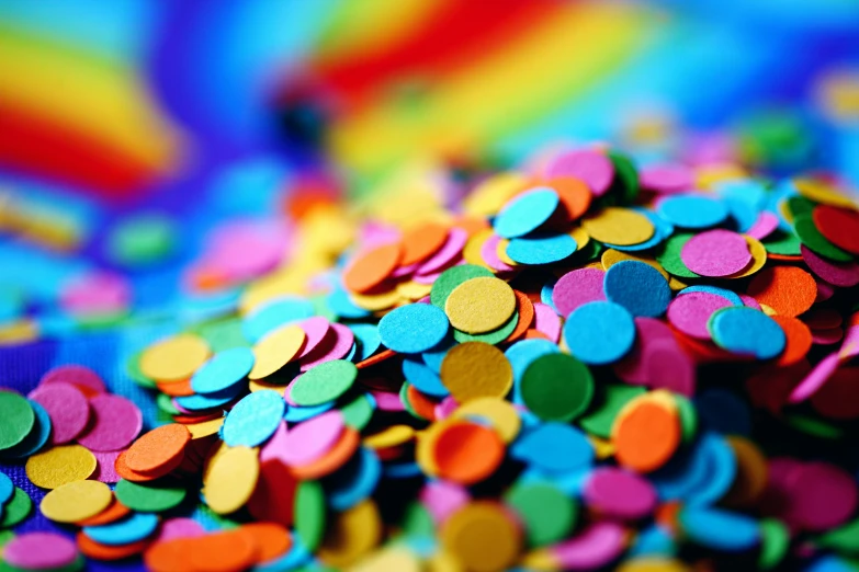 a pile of colorful confetti sprinkles, inspired by Howardena Pindell, pexels, made of dots, photography of kurzgesagt, beautiful surroundings, rainbow colours