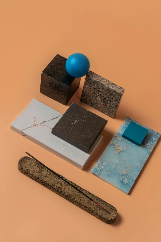 a group of objects sitting on top of a table, by Tobias Stimmer, earth colors, rectangle, blue and black scheme, material pack