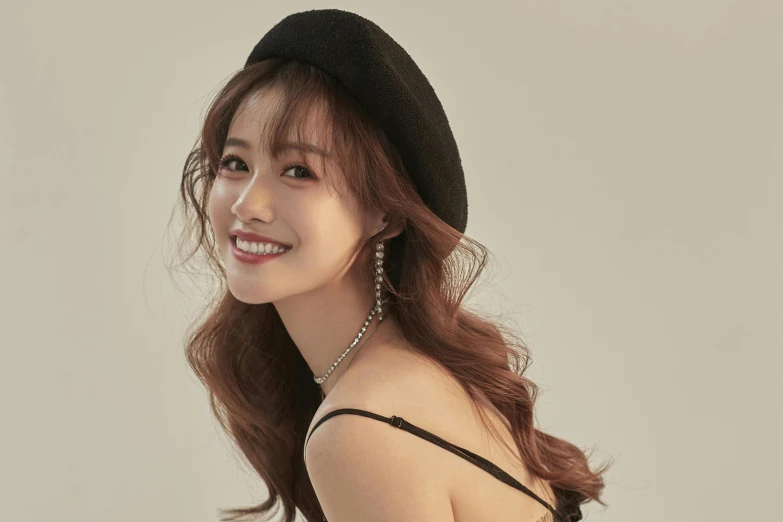 a woman in a black dress and a black hat, inspired by Kim Jeong-hui, trending on instagram, wavy shoulder-length hair, official product photo, wearing a beret, brown ) )