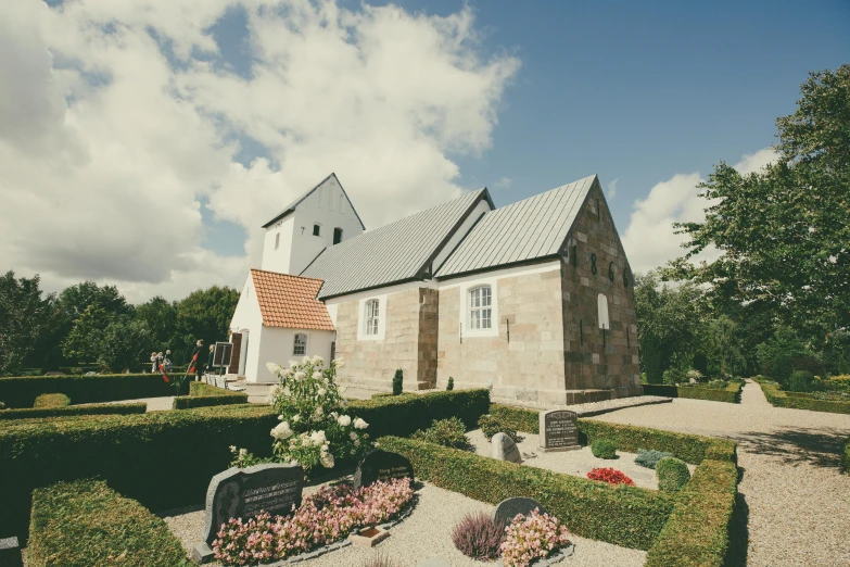 a church sitting in the middle of a lush green park, by Jesper Knudsen, wedding, well preserved, exterior, farmhouse