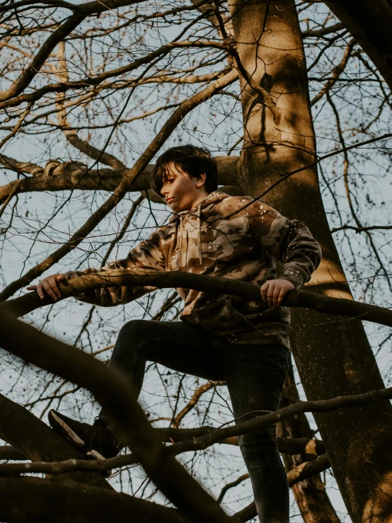a boy climbing a tree on a skateboard, pexels contest winner, wearing camo, declan mckenna, looking off into the distance, ((trees))