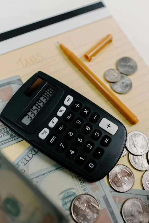 a calculator sitting on top of a pile of money, educational supplies, thumbnail, ✨🕌🌙, - 9