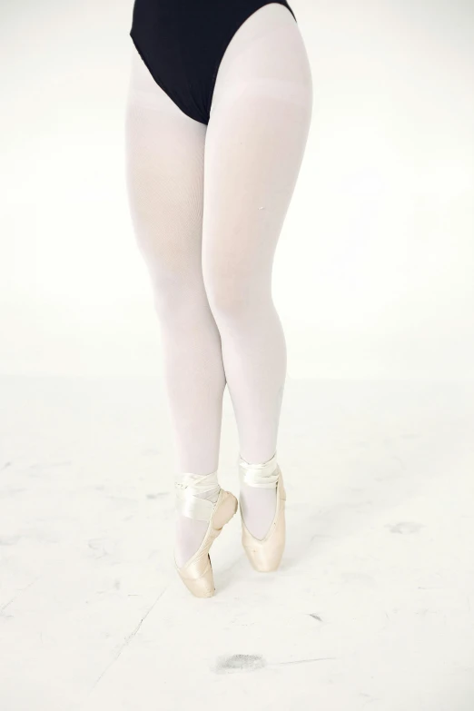 a woman in a black leo leo leo leo leo leo leo leo leo leo leo leo leo, an album cover, inspired by Elizabeth Polunin, unsplash, arabesque, wearing white tights, gradient white to silver, high key, soft white rubber