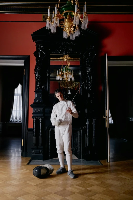 a man in a white suit standing in a room, inspired by Horace Vernet, pexels contest winner, baroque, fencing, chateau frontenac, boys, full body photograph