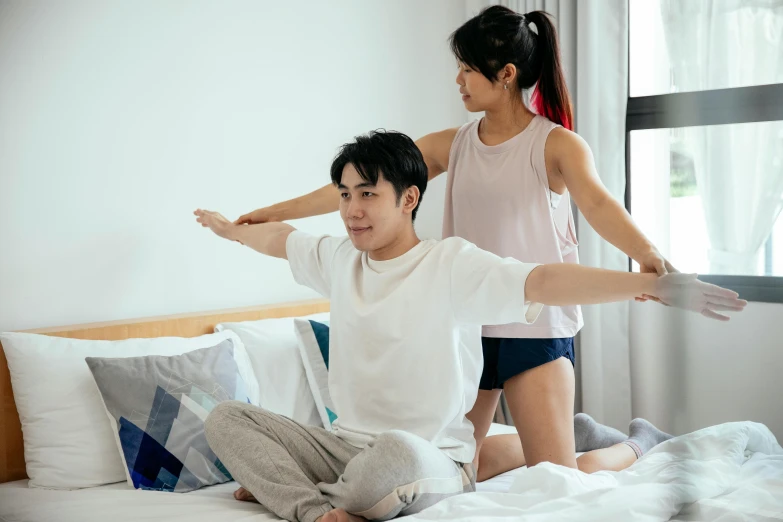 a man sitting on top of a bed next to a woman, a cartoon, pexels contest winner, hurufiyya, dynamic stretching, set on singaporean aesthetic, waist reaching ponytail, straight arms