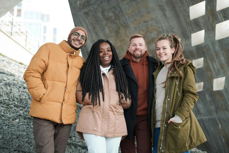 a group of people standing next to each other, pexels contest winner, reykjavik junior college, light-brown skin, optimistic, avatar image