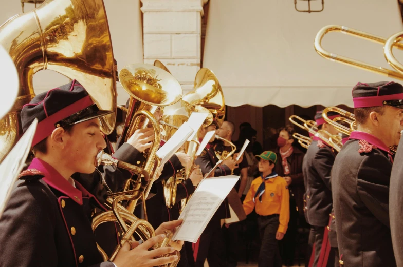 a group of men in uniform playing brass instruments, by Francesco Furini, pexels contest winner, quito school, avatar image, 🚿🗝📝, grainy quality, banner