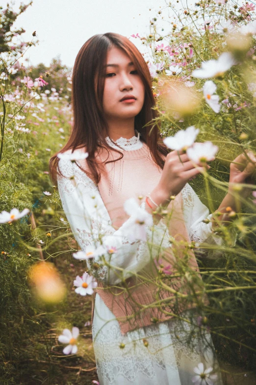 a woman standing in a field of flowers, by Tan Ting-pho, aestheticism, white sleeves, portrait of a japanese teen, medium format, 8 k )