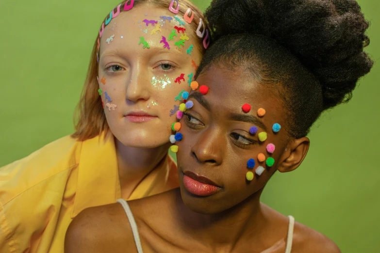 a couple of women standing next to each other, trending on pexels, hyperrealism, neon face paint, white freckles, druillet colorful, black teenage girl