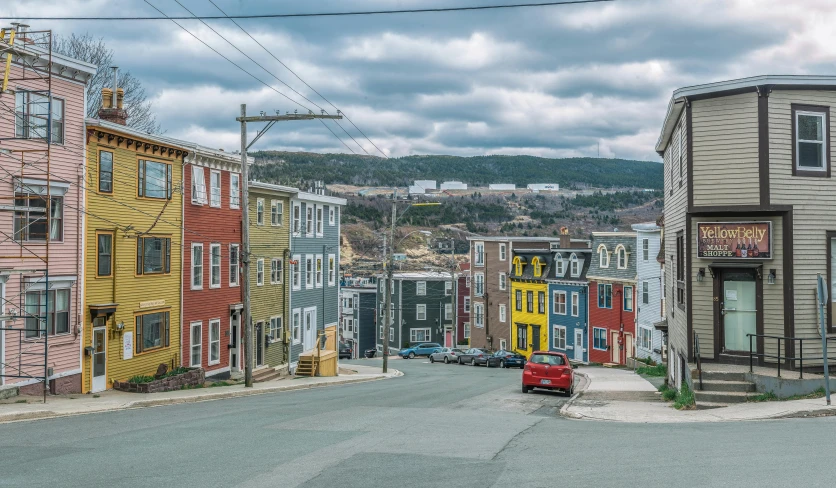 a city street filled with lots of colorful buildings, top of the hill, lewis carrol, in colour, pintrerest