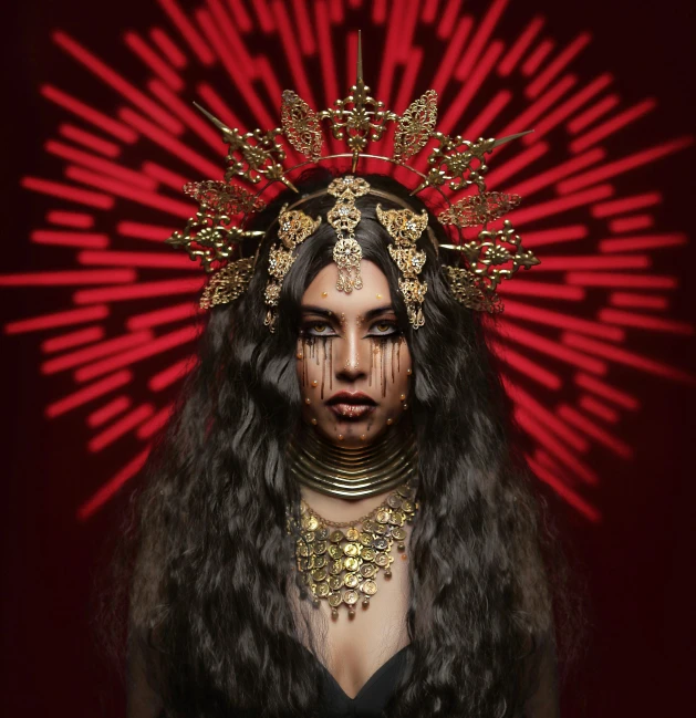 a woman with long black hair wearing a crown, an album cover, inspired by Hedi Xandt, pexels contest winner, gothic art, high red lights, shanina shaik as medusa, ornate metal gold headpiece, elaborate costume
