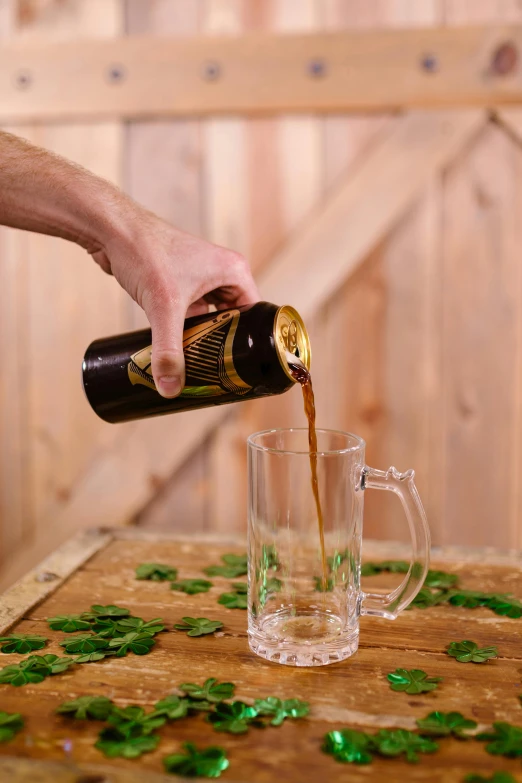 a man pours a beer into a glass, by Ben Zoeller, fully covered, combine, on a wooden desk, caparisons